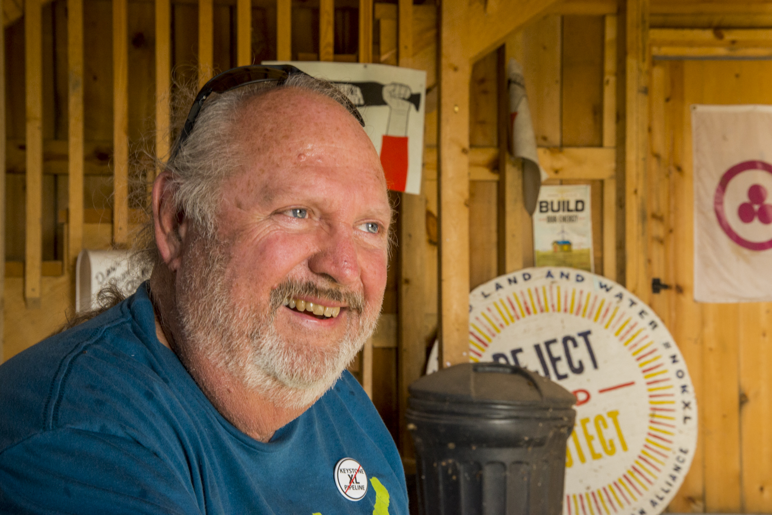USA: Nebraska, No Water No Life, NWNL, Missouri R-Tribs Expedition, west of Benedict  (York Co, pop 236), interview with Tom Genung inside "Energy Barn" built 2013 on proposed Keystone XL route by "pipeline fighters" with 1 kw energy system from solar & wind