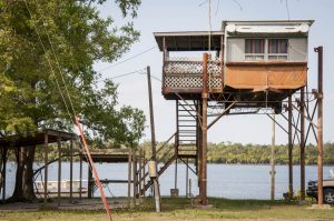 USA:  Louisiana, Old River Landing, off of Rt 419 east of levee, trailer on stilts to avoid Mississippi River floods