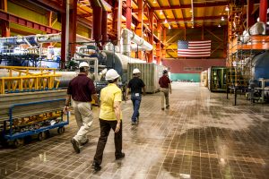 USA: Tennessee, Appalachia, Tennessee River Basin, SEJ Energy Tour, Sequoyah Nuclear Plant, owned by Tennessee Valley Authority (TVA), interior of the diesel generator building, American flag on back wall, PR