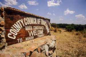 Kenya: Maasai (aka Masai) Mara National Reserve, Mara Conservancy, Mara Triangle, entrance sign at Mara River bridge.