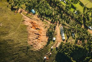 Africa:  Kenya, Mara River Basin Expedition for NWNL, flite over Mau Forest to document deforestation, aerial view of construction and excavation in what used to be forest
